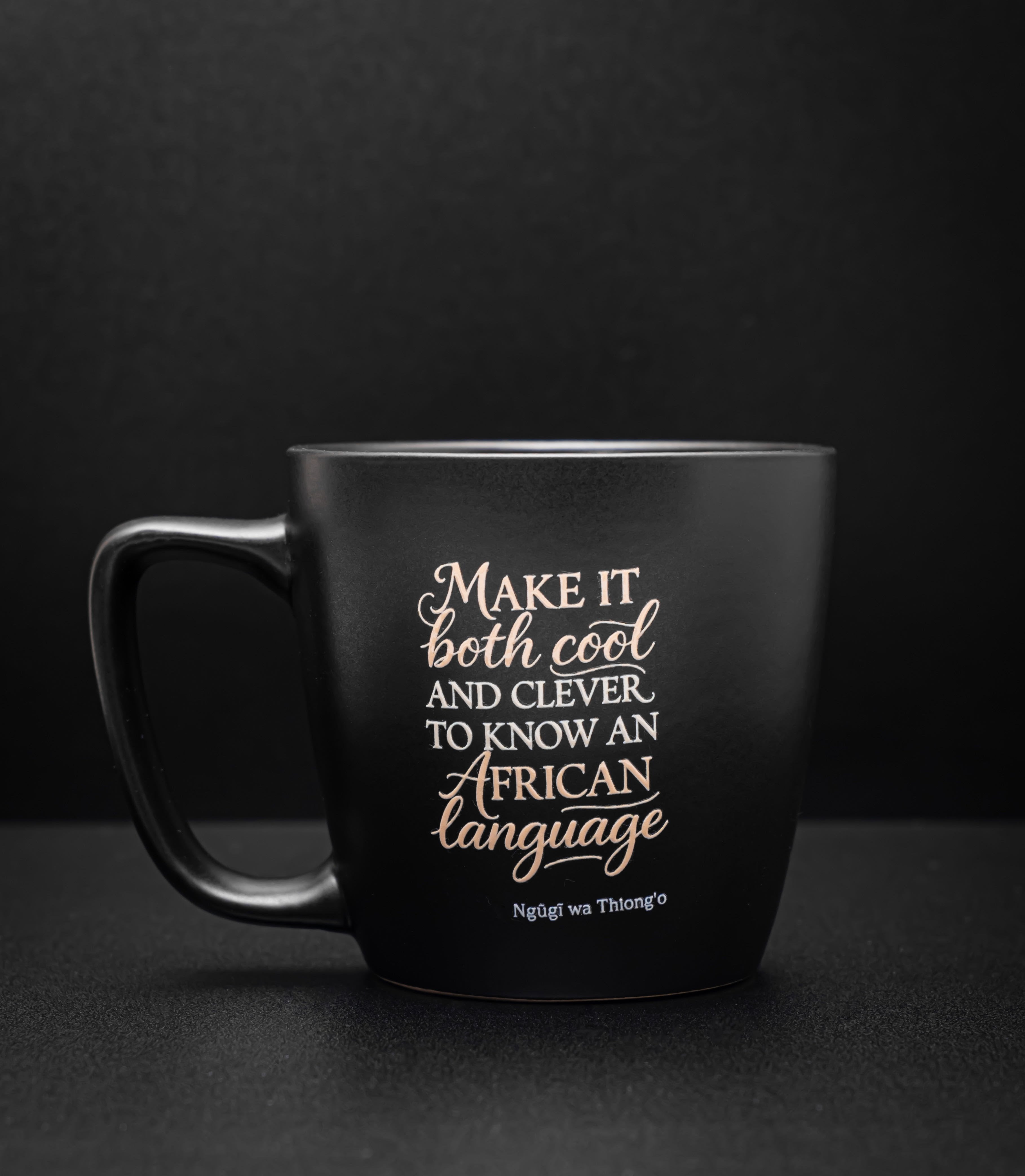14 oz Solid Matte Black Stoneware Mug -- "Make it both cool and clever to know an African language"
